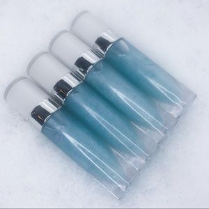 “SNOWED IN” lipgloss